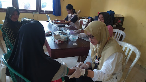 SINERGI MAHASISWA KKN-PPM UGM DAN MASYARAKAT DESA DADI DALAM PELAKSANAAN POSYANDU